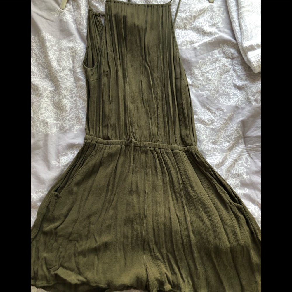 Green romper with open back